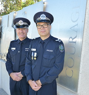 Officers Knight and Emms with their Police Bravery Medal